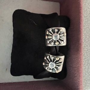 This bead is both gold and silver both sides with cz’s both sides